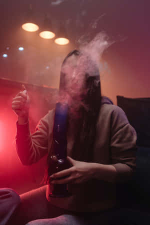 A Woman Smoking A Vaporizer In A Living Room Wallpaper