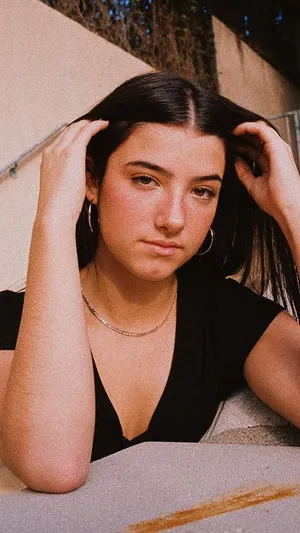 A Woman With Long Hair Wallpaper