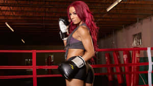 A Woman With Red Hair Standing In A Boxing Ring Wallpaper