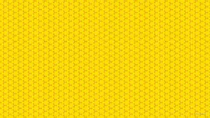 A Yellow Background With A Pattern Of Dots Wallpaper