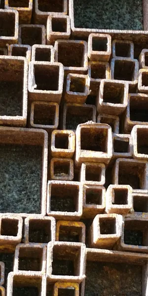 A Yellow Dandelion Grows From Green Grass By A Wooden Fence Wallpaper