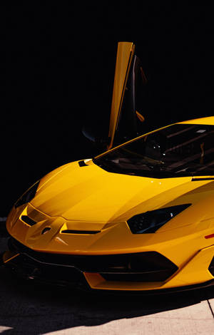 A Yellow Sports Car Wallpaper