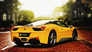 A Yellow Sports Car Is Parked On A Street Wallpaper