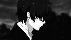 A Young Anime Character Lost In Thought And Sorrow. Wallpaper