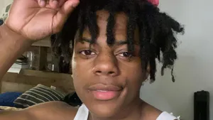 A Young Man With Dreadlocks Is Posing For A Picture Wallpaper