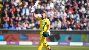 Aaron Finch - The Powerhouse Of Australian Cricket Wallpaper