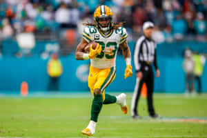 Aaron Jones, Running Back For The Green Bay Packers Wallpaper