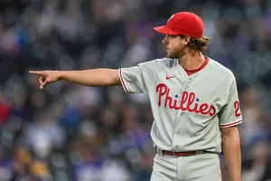 Aaron Nola, A Star Player, Pointing To Victory Wallpaper