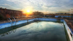 Abandoned Outdoor Pool Sunset Wallpaper
