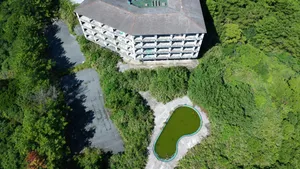 Abandoned Pool And Building Wallpaper