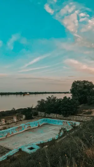 Abandoned Pool By The Lake Wallpaper