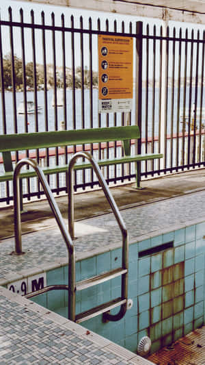 Abandoned Pool With Rust Stains Wallpaper