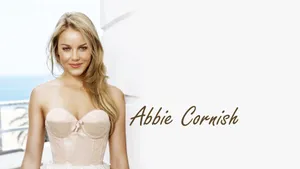 Abbie Cornish Striking A Pose In A Classy Outfit Wallpaper