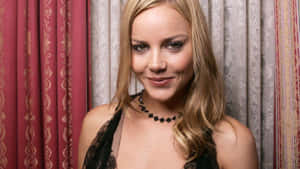 Abbie Cornish Striking A Pose In A Photoshoot Wallpaper