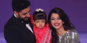 Abhishek Bachchan With Daughter Wallpaper