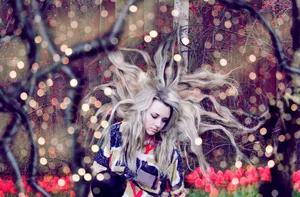 Absurd Girl With Flying Hair Wallpaper