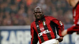 Ac Milan Legend George Weah In Action Wallpaper