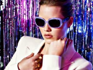 Accessorizing With Purple Can Add A Stylish And Modern Vibe To Any Outfit. Wallpaper