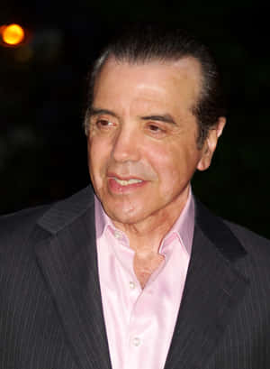 Acclaimed Actor Chazz Palminteri In Classic Black Suit Wallpaper