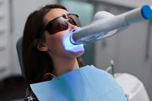 Achieve A Brighter And Whiter Smile With Teeth Whitening Wallpaper