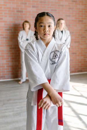 Achieve Success In Taekwondo With A High Quality Uniform Wallpaper