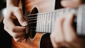 Acoustic Guitar Hands Strumming Wallpaper