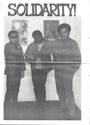 Activists From The Black Panther Party Proudly Waving The Flag To Celebrate Their Struggle Against Racism Wallpaper