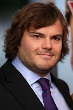 Actor And Comedian Jack Black Wearing A Backwards Baseball Cap. Wallpaper