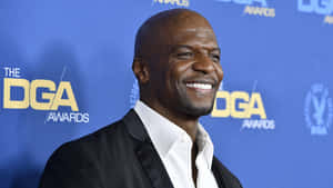 Actor And Former Nflplayer Terry Crews Has Seen Success In Every Facet Of His Career. Wallpaper