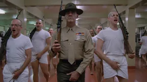 Actor And Marine Corps Veteran R. Lee Ermey, Immortalized For His Iconic Roles In Full Metal Jacket And Toy Story Wallpaper