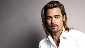 Actor Brad Pitt Mixes Casual Chic With Long Hair And Beard Wallpaper