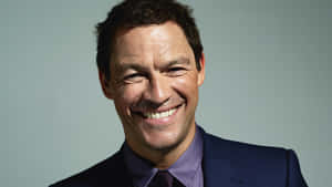 Actor Dominic West Striking A Pose.