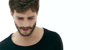 Actor Jamie Dornan Gazing Piercingly| Wallpaper