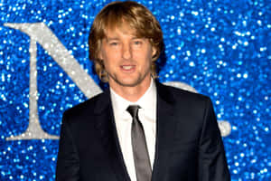 Actor Owen Wilson Strikes A Dashing Pose. Wallpaper