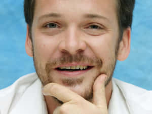 Actor Peter Sarsgaard Poses For Cameras On The Red Carpet. Wallpaper