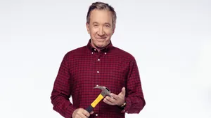 Actor Tim Allen Strikes A Charming Pose Wallpaper