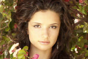 Actress Alice Greczyn Striking A Pose Wallpaper