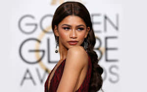 Actress And Singer Zendaya Looking Stunning In A Blue Dress. Wallpaper