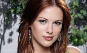 Actress Danneel Ackles Striking A Pose At A Photoshoot. Wallpaper