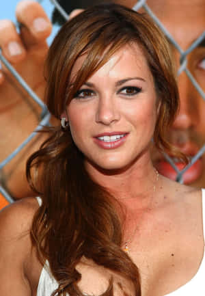 Actress Danneel Ackles Striking A Pose On A Photoshoot. Wallpaper