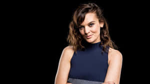 Actress Frankie Shaw Smiling Alluringly At Photo-shoot Wallpaper