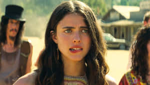 Actress Margaret Qualley Posing For A Photoshoot. Wallpaper