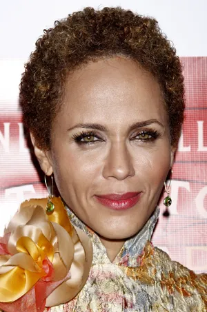 Actress Nicole Ari Parker Striking A Pose Wallpaper