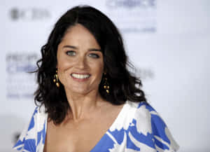 Actress Robin Tunney Striking A Pose Wallpaper