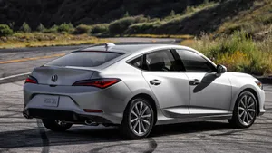 Acura Integra Sport Coupe In A Picturesque Setting Wallpaper