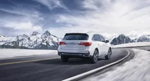 Acura Mdx Luxury Suv On The Road Wallpaper