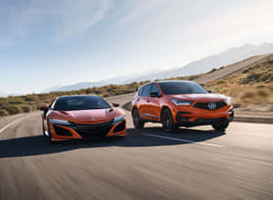 Acura Rdx 2023 Driving On A Scenic Route Wallpaper