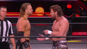 Adam Page And Kenny Omega Inside Aew Ring Wallpaper