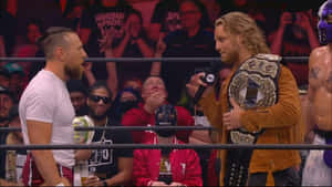 Adam Page His Aew Belt To Bryan Danielson Wallpaper