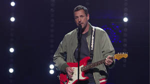 Adam Sandler Playing Electric Guitar Wallpaper